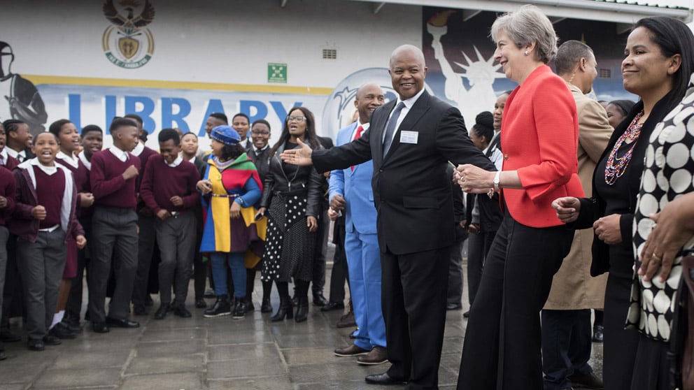 Cyril Ramaphosa con Theresa May en Sudáfrica (Foto: AFP)