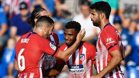Los jugadores del Atlético celebran el gol frente al Getafe. (AFP)