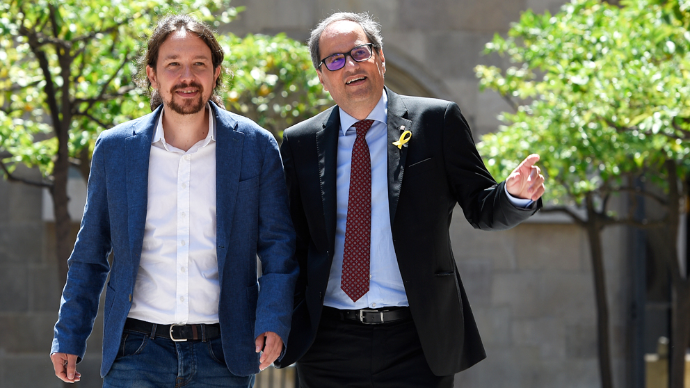 Pablo Iglesias y Quim Torra. (Foto: AFP)