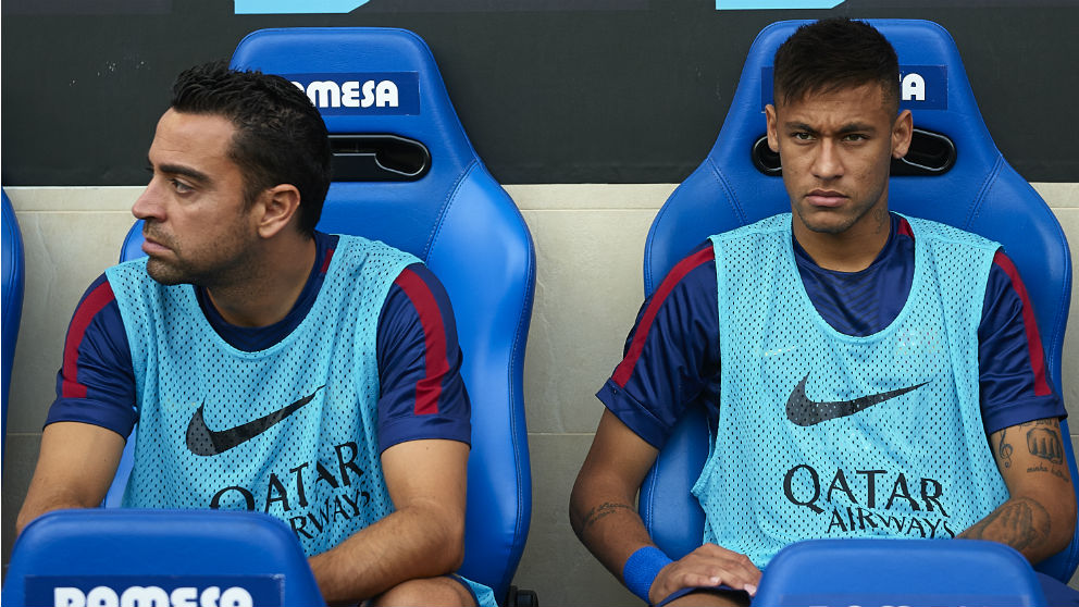 Xavi y Neymar durante su etapa en el Barcelona. (Getty)