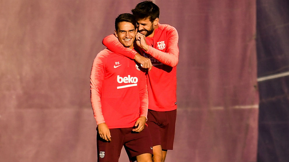 Denis Suárez y Piqué durante un entrenamiento. (Getty)