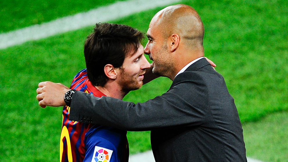 Messi y Guardiola, durante su etapa en el Barcelona. (Getty)