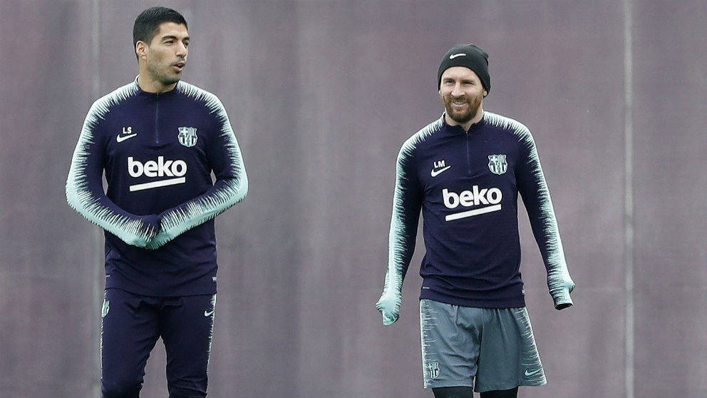 Messi y Suárez, durante un entrenamiento. (EFE)