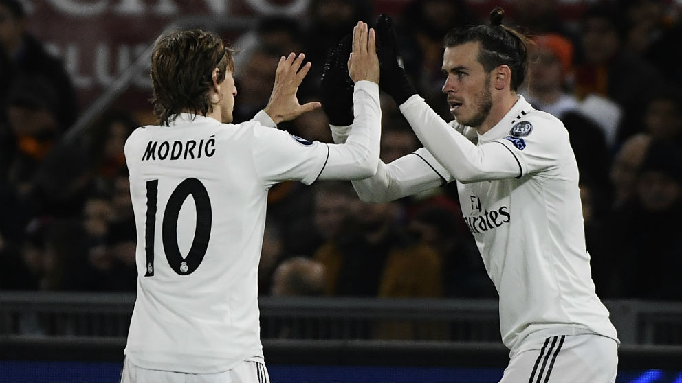 Bale celebra un gol con Modric. (AFP)