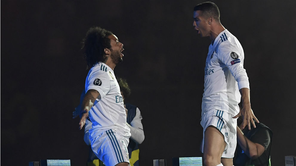 Marcelo y Cristiano Ronaldo, durante la celebración de la Champions. (AFP)