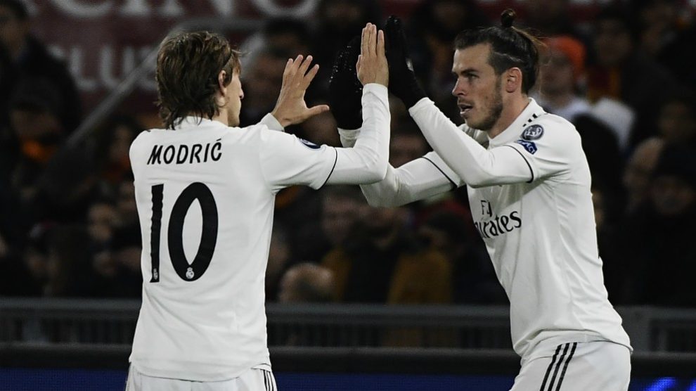 Luka Modric y Gareth Bale celebran un gol del galés en Champions. (AFP)
