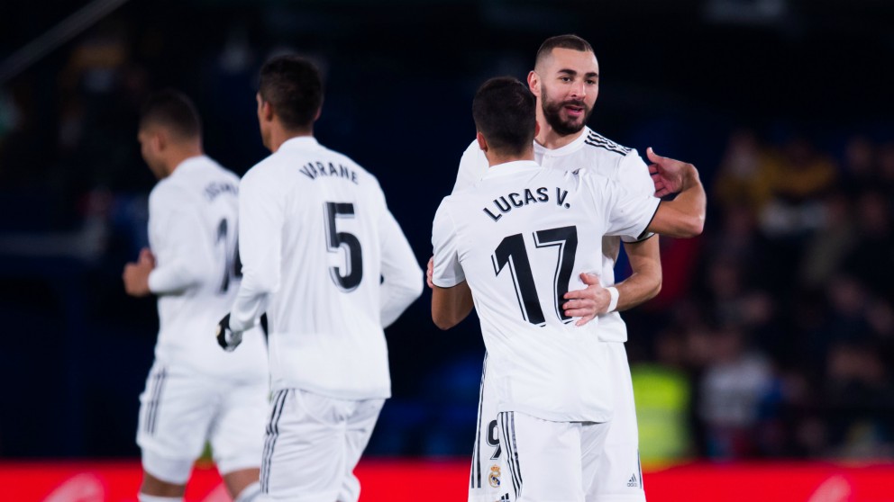 Benzema y Lucas Vázquez celebran un gol. (Getty)