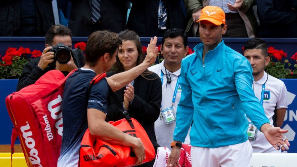 Ferrer se despide de Nadal a su salida de la pista. (EFE)