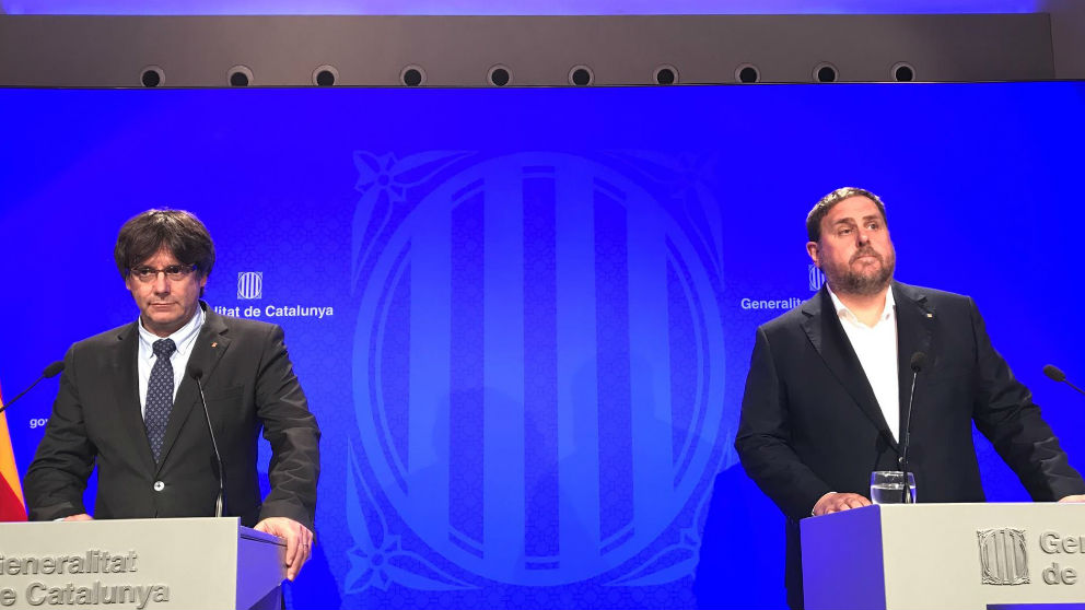 Carles Puigdemont y Oriol Junqueras.