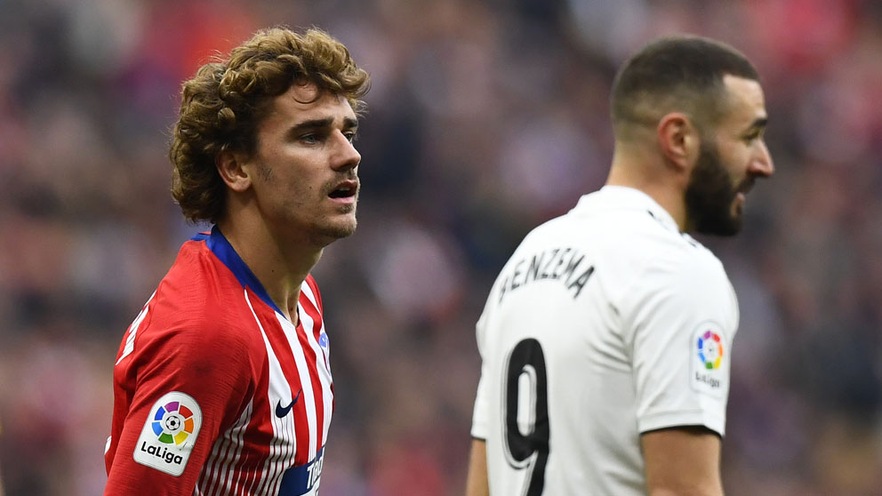 Griezmann-con-Benzema,-durante-el-último-derbi-de-la-Liga-(AFP)