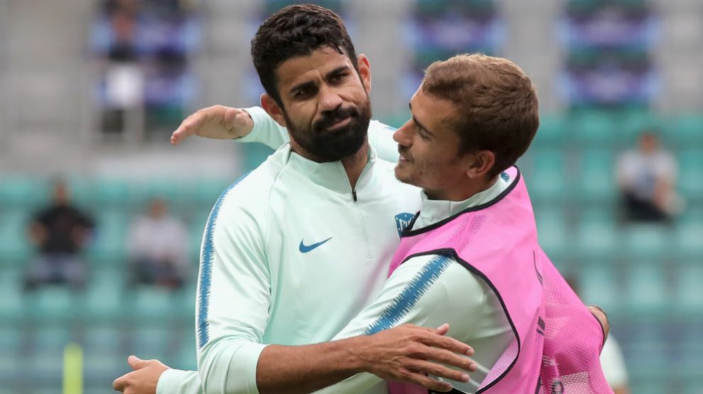 Diego Costa y Griezmann, en un entrenamiento. (AFP)