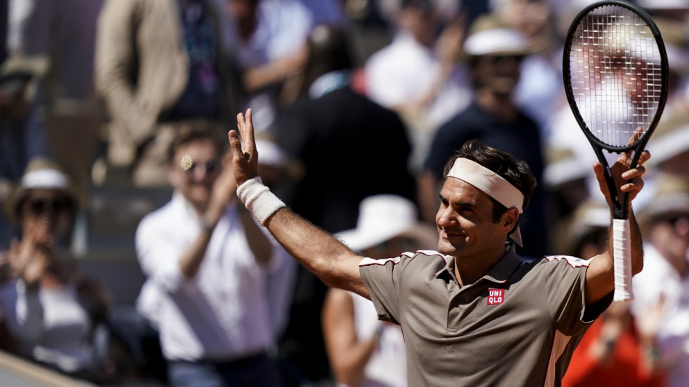 Federer celebra su victoria ante Mayer. (AFP)