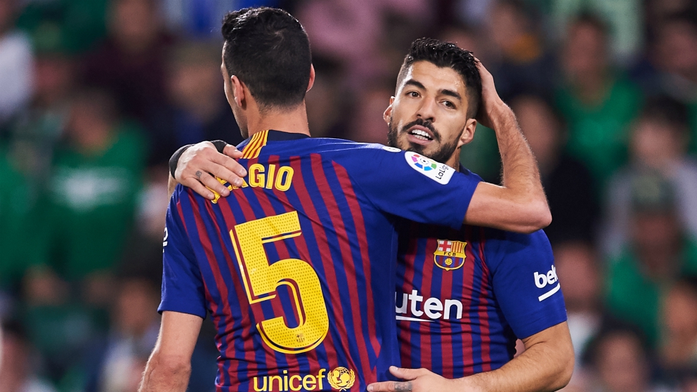 Sergio Busquets y Luis Suárez, esta temporada con el Barça. (Getty)