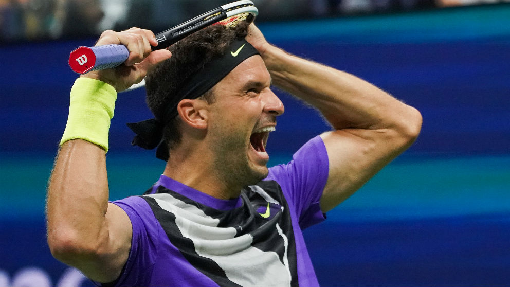 Dimitrov celebra su victoria ante Federer. (AFP)