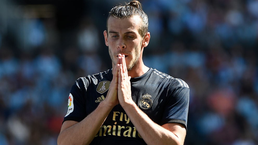 Gareth Bale se lamenta durante un partido con el Real Madrid. (AFP)