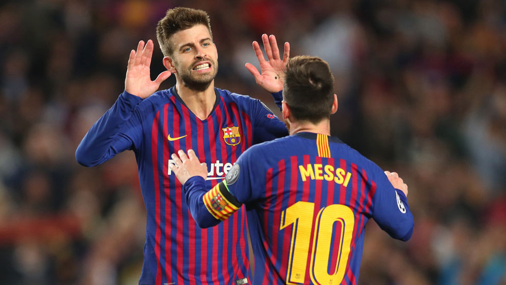Gerard-Piqué-y-Leo-Messi,-durante-un-partido-(Getty)