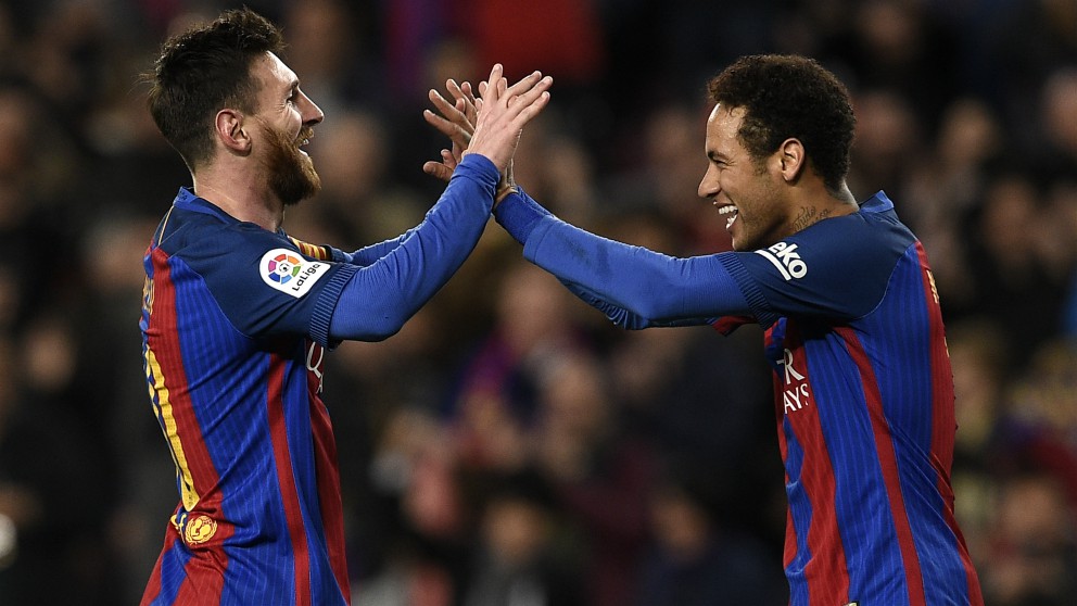 Messi y Neymar, en un partido con el Barcelona. (AFP)