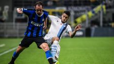 Luis Alberto con Godín (AFP)