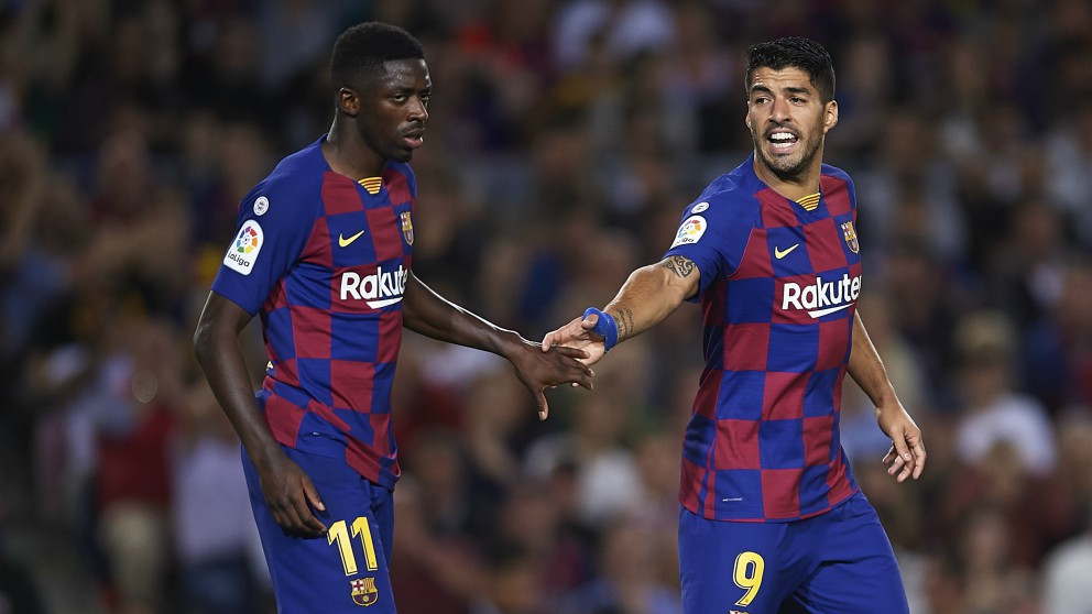 Dembélé y Luis Suárez, en un partido del Barcelona. (Getty)