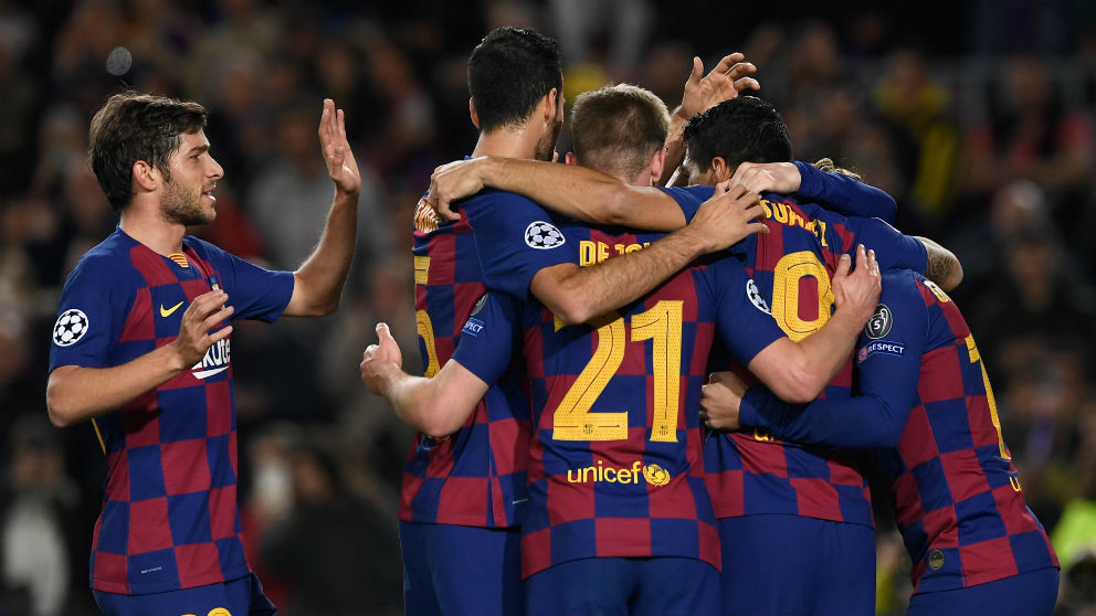 Los jugadores del Barcelona celebran uno de los goles al Dortmund. (AFP)