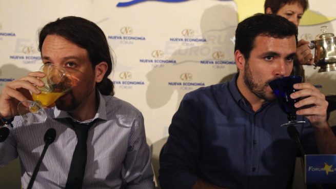 Pablo Iglesias y Alberto Garzón en un evento.