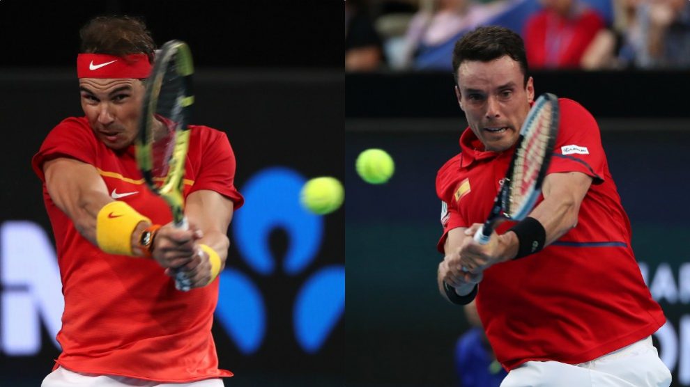 Rafael Nadal y Roberto Bautista, en acción en la ATP Cup. (Getty)