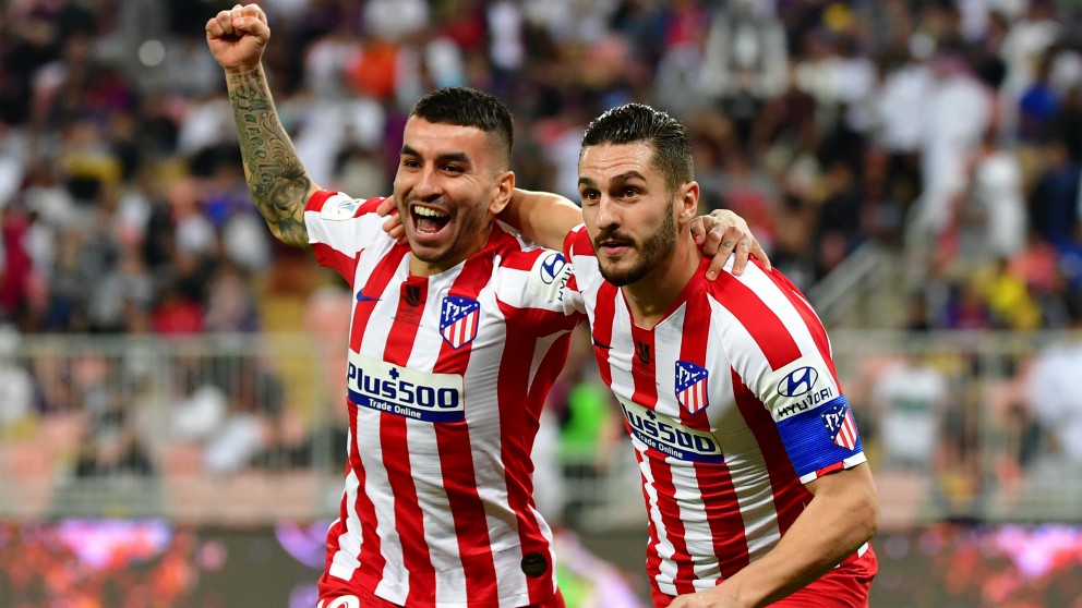 Ángel Correa y Koke celebran un gol con el Atlético. (AFP)