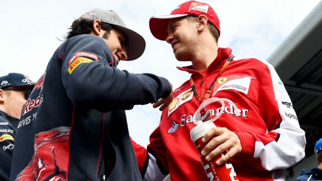 Carlos Sainz y Vettel