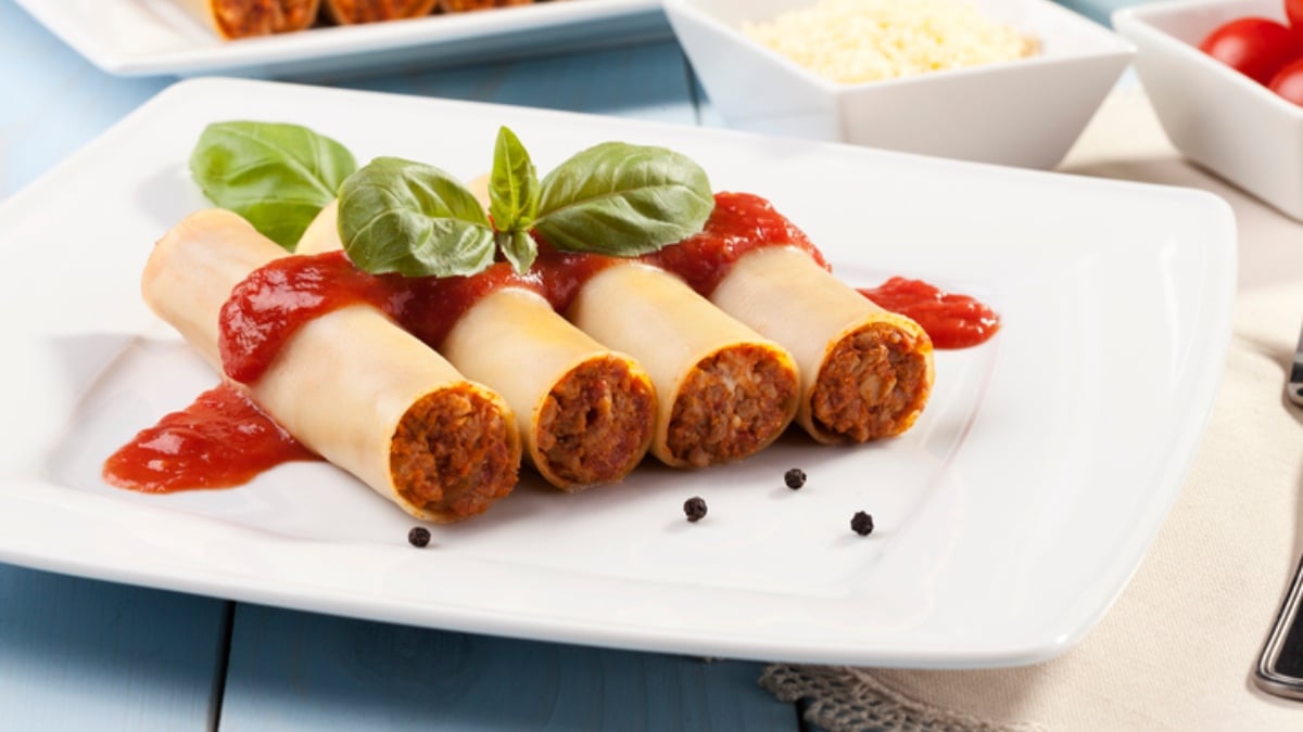 Canelones de manitas de cerdo con setas