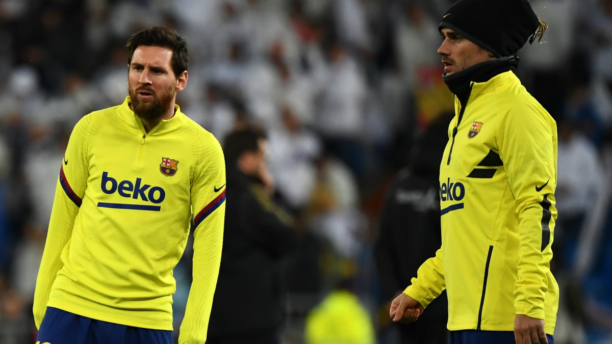 Leo Messi y Antoine Griezmann durante un calentamiento con el Barcelona. (Getty)