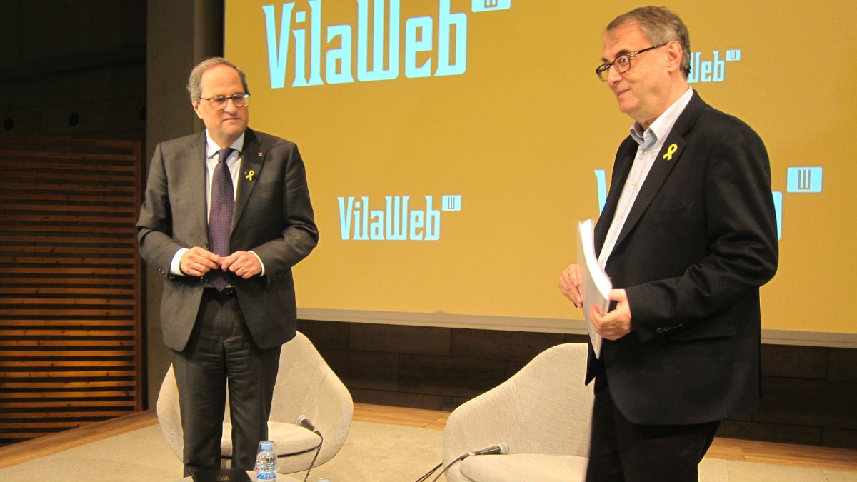 Quim Torra, presidente de la Generalitat de Cataluña, y Vicent Partal, director de ‘Vilaweb’. (Foto: Europa Press)