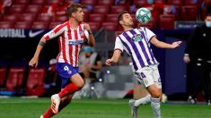 Álvaro Morata con Kiko Olivas. (AFP)