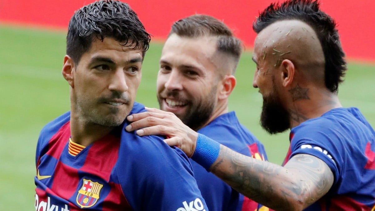 Luis Suárez celebra uno de sus goles ante el Celta. (EFE)