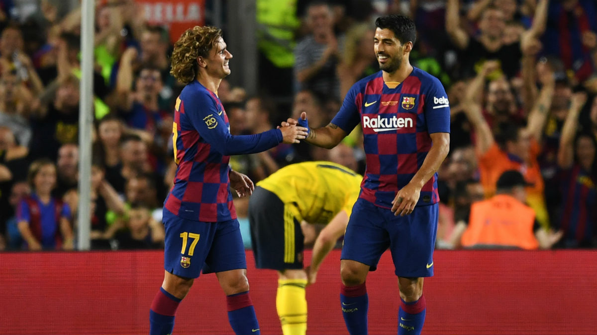 Luis Suárez y Antoine Griezmann, durante un partido con el Barcelona. (Getty)