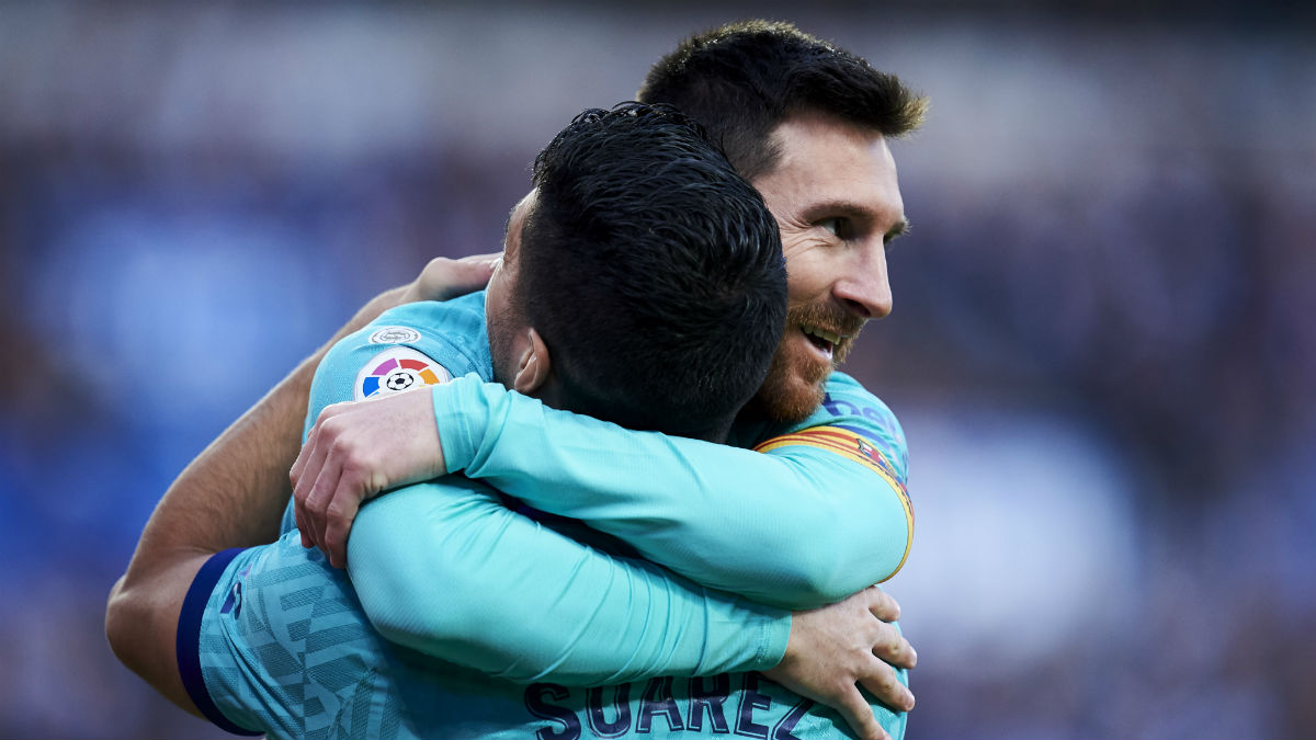 Leo Messi y Luis Suárez celebran un tanto. (Getty)
