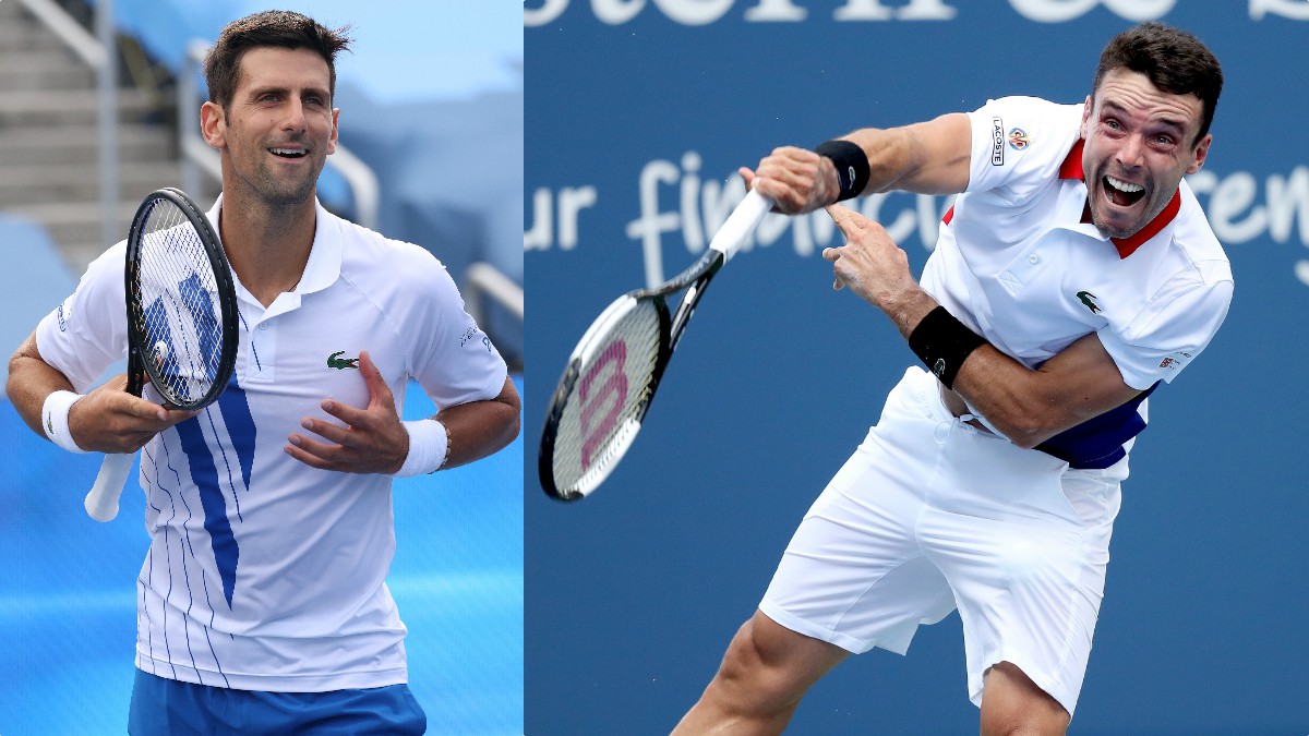 Djokovic y Bautista. (AFP)