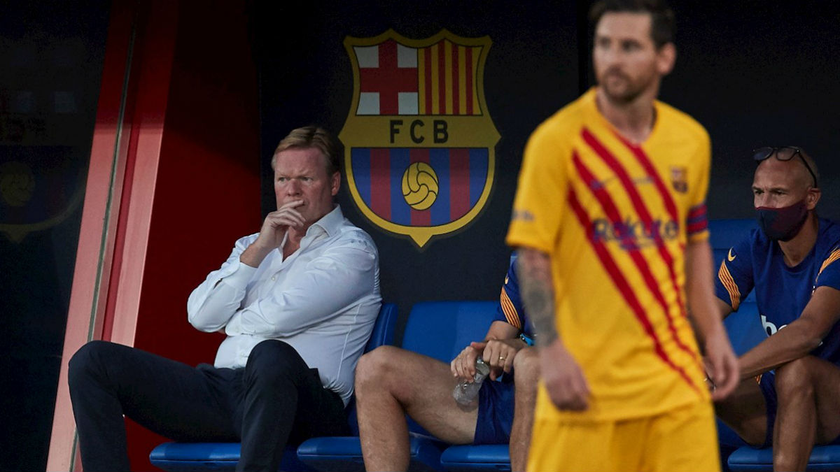 Koeman y Messi, en el partido contra el Nástic. (EFE)