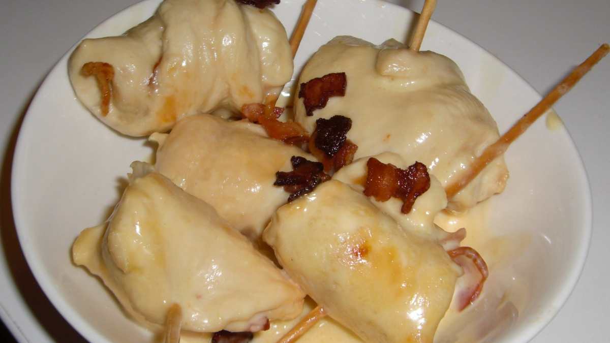 Receta de rollitos de pollo con jamón, queso y frutos secos