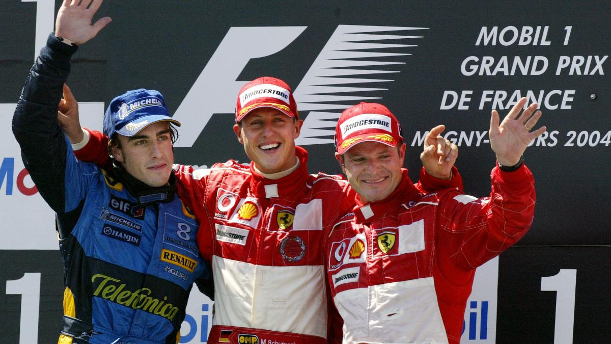 Fernando Alonso, Michael Schumacher y Rubens Barrichello. (AFP)