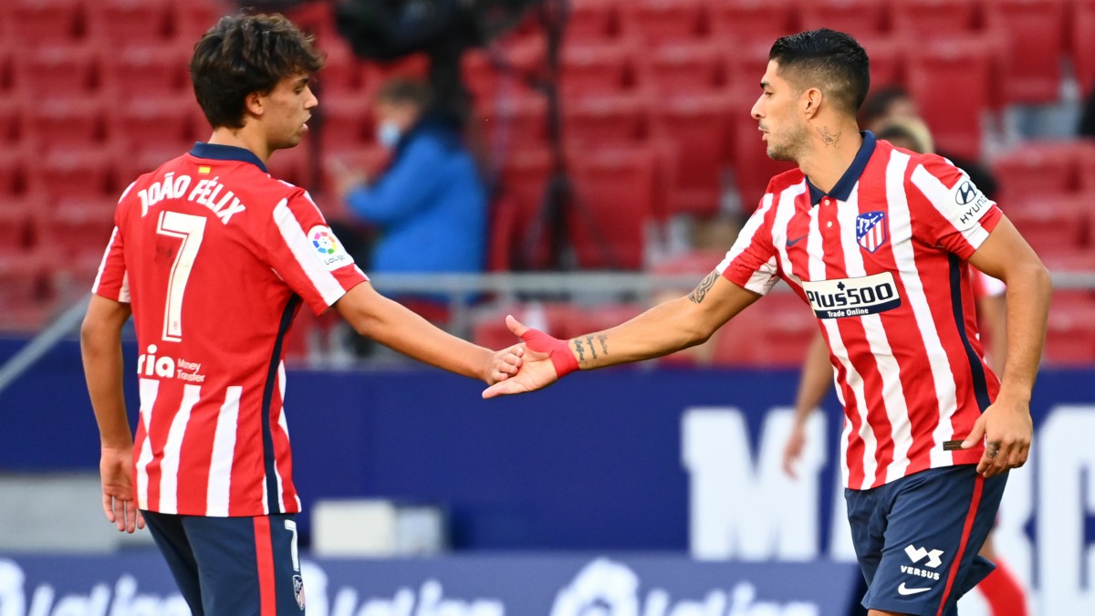 Joao Félix y Luis Suárez durante un partido con el Atlético esta temporada. (AFP)