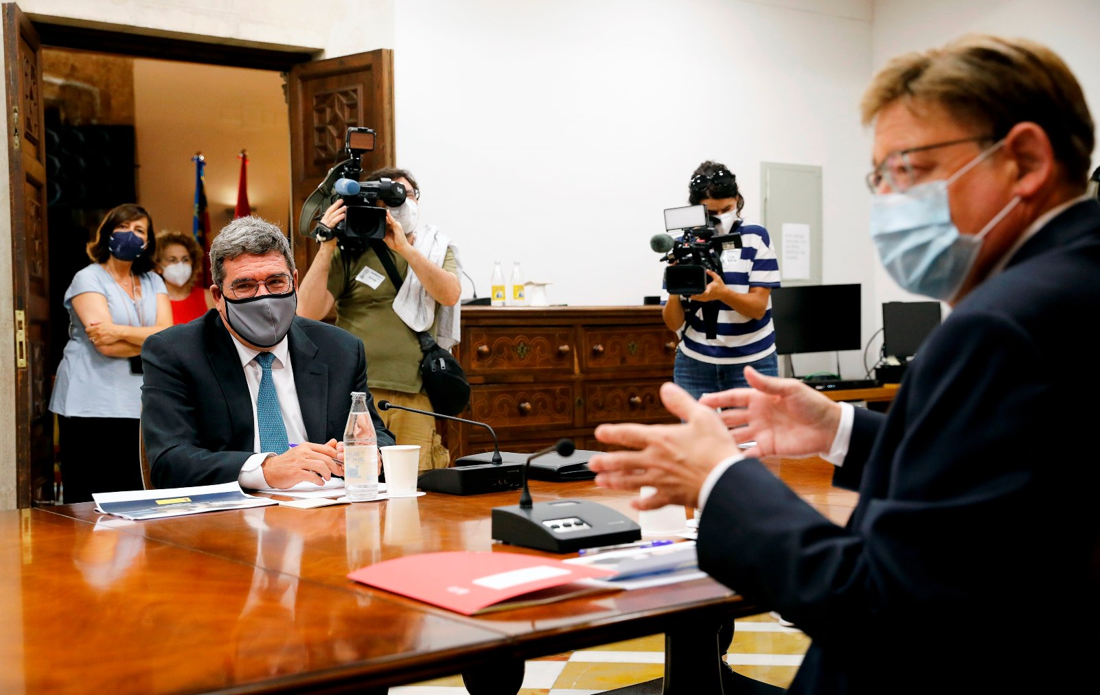 El ministro de Inclusión, José Luis Escrivá, con el presidente valenciano, Ximo Puig.