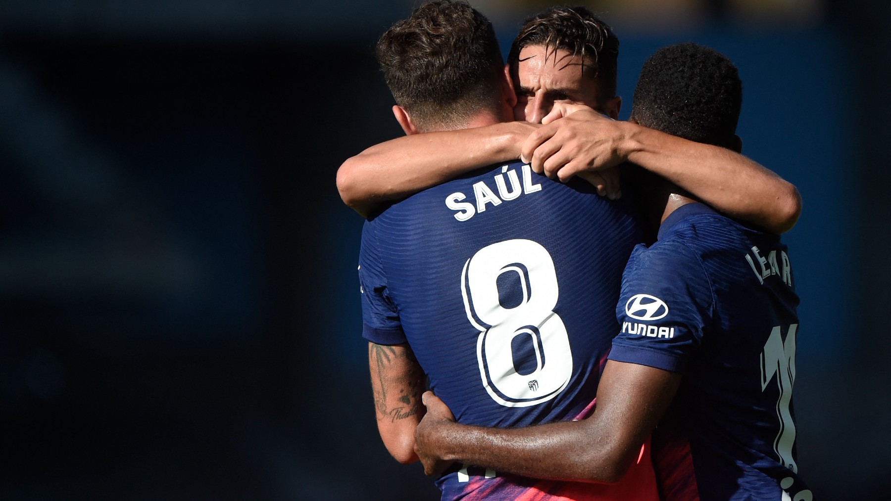Saúl, Koke y Lemar celebran un gol al Celta. (AFP)