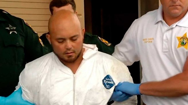 Bryan Riley tras ser detenido por matar a cuatro personas, entre ellas un bebé.