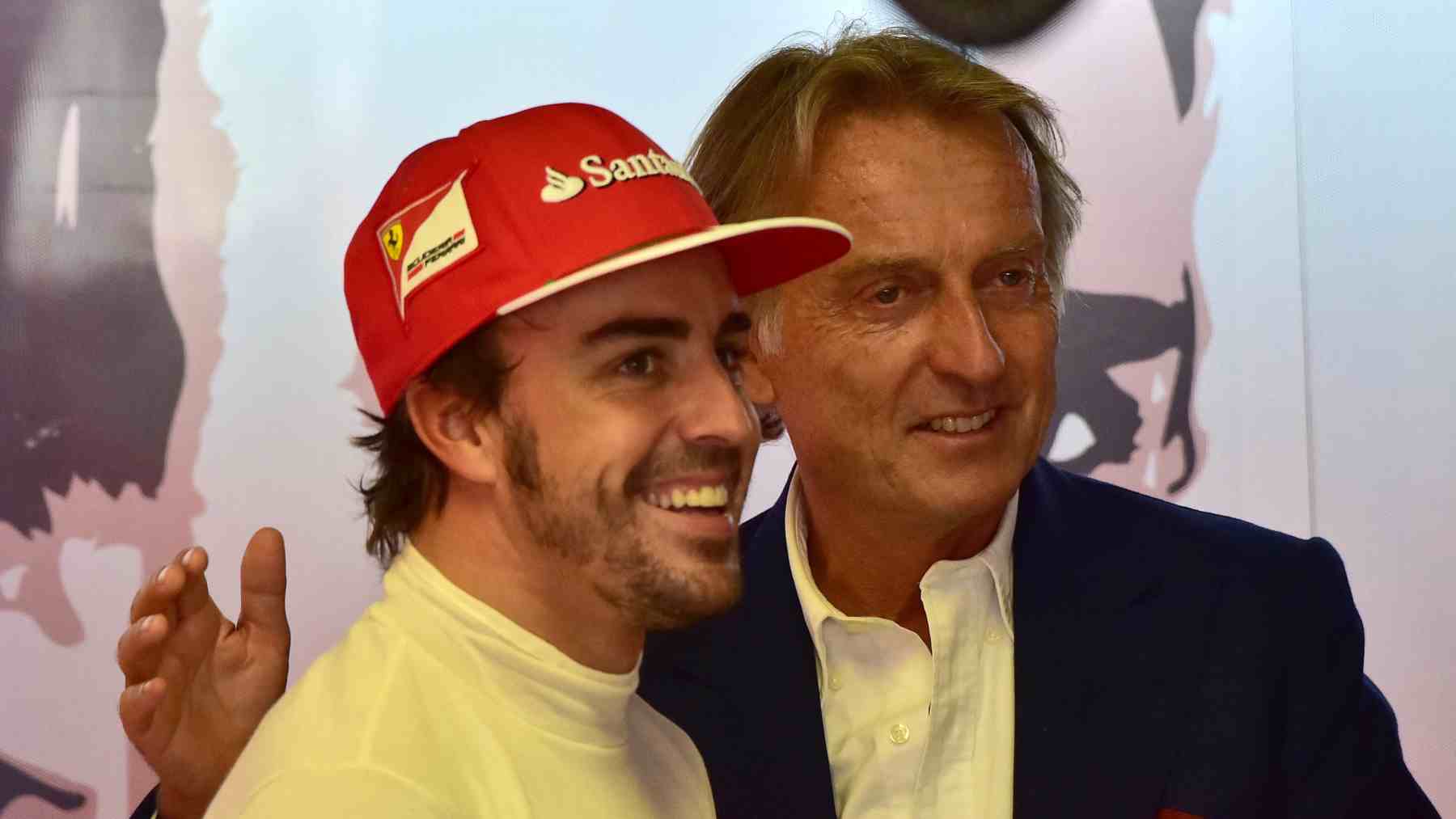 Fernando Alonso y Luca Cordero di Montezemolo durante su etapa en Ferrari. (AFP)