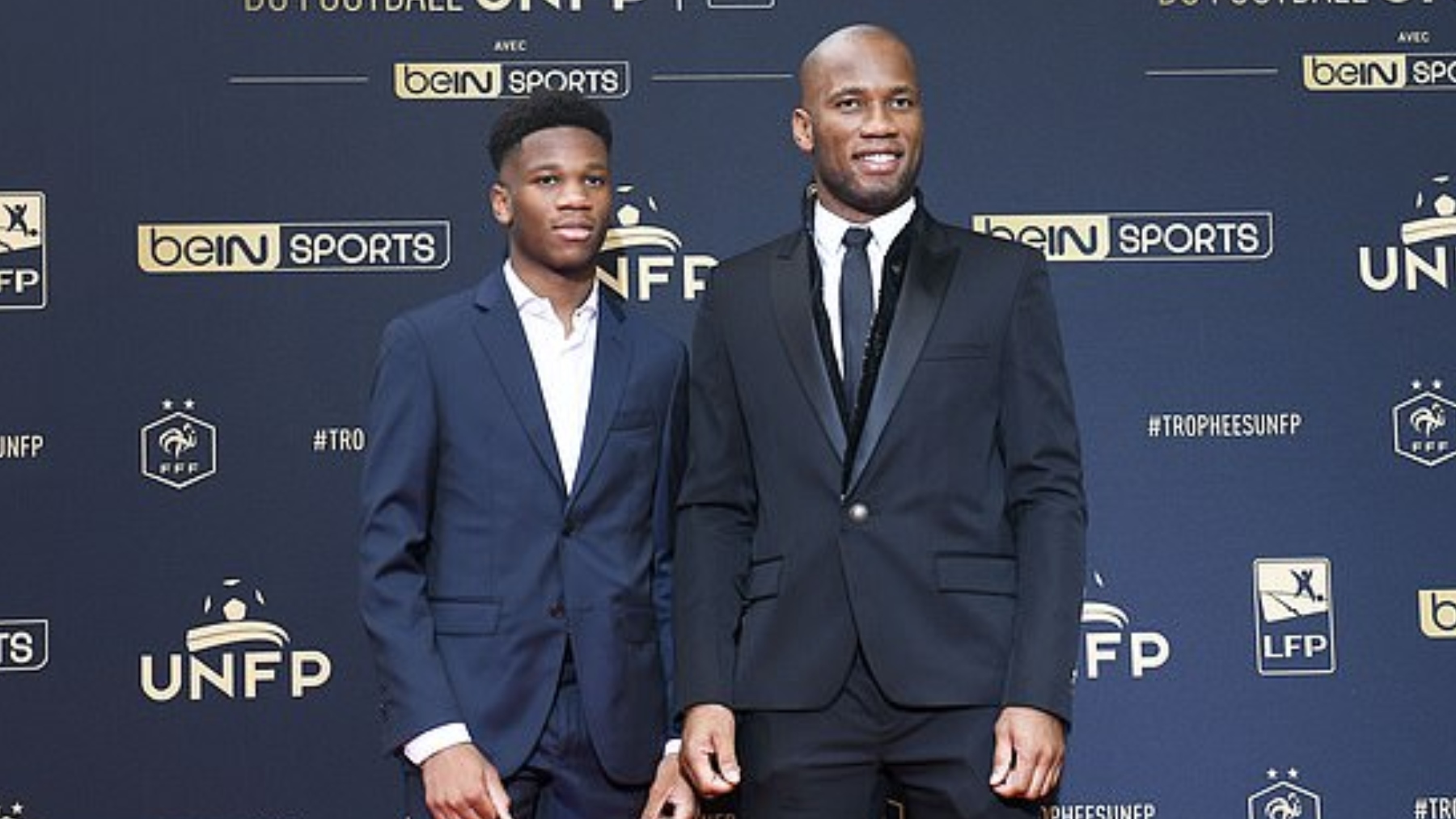 Isaac y Didier Drogba.