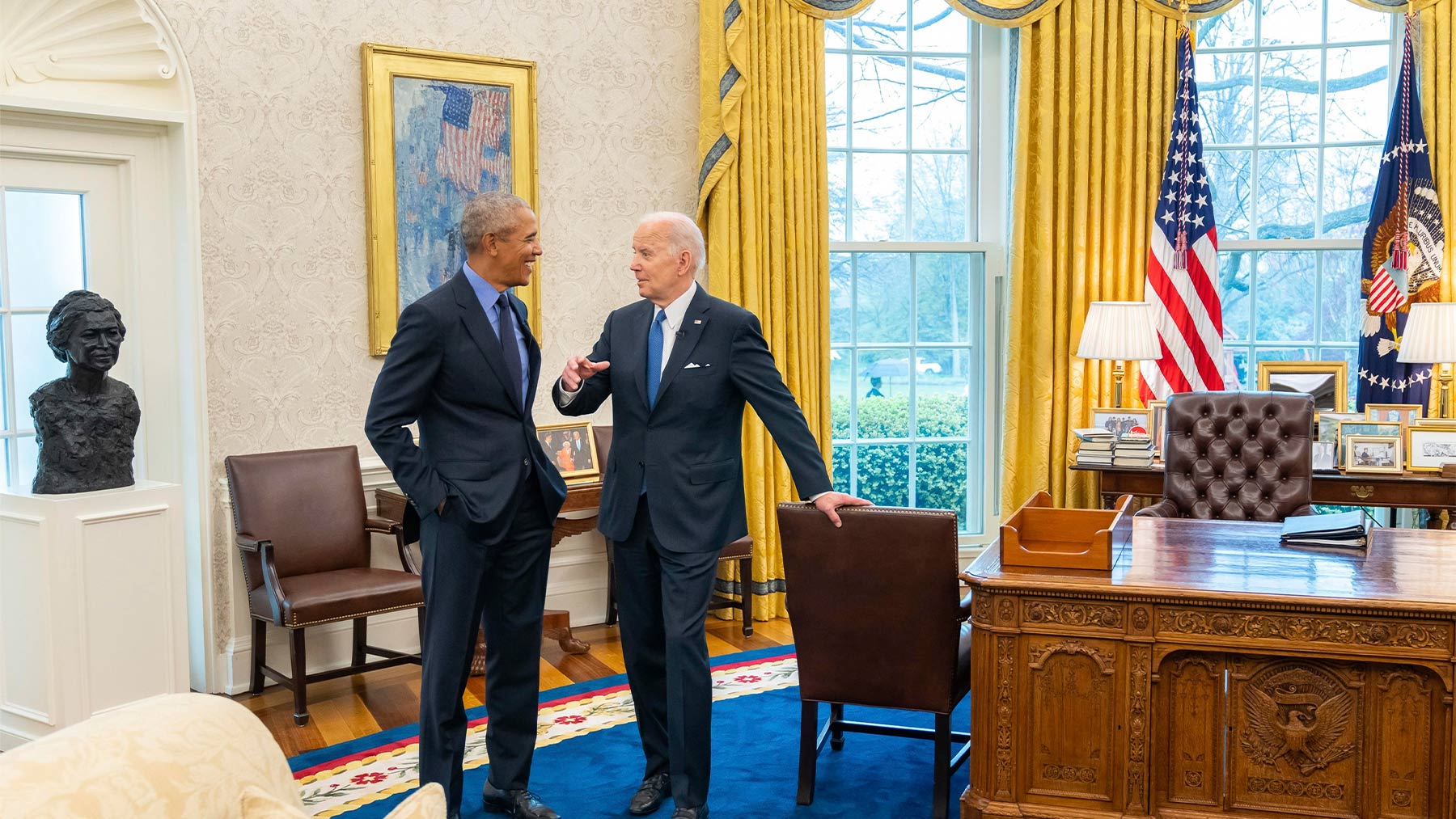 Biden conversa con Obama