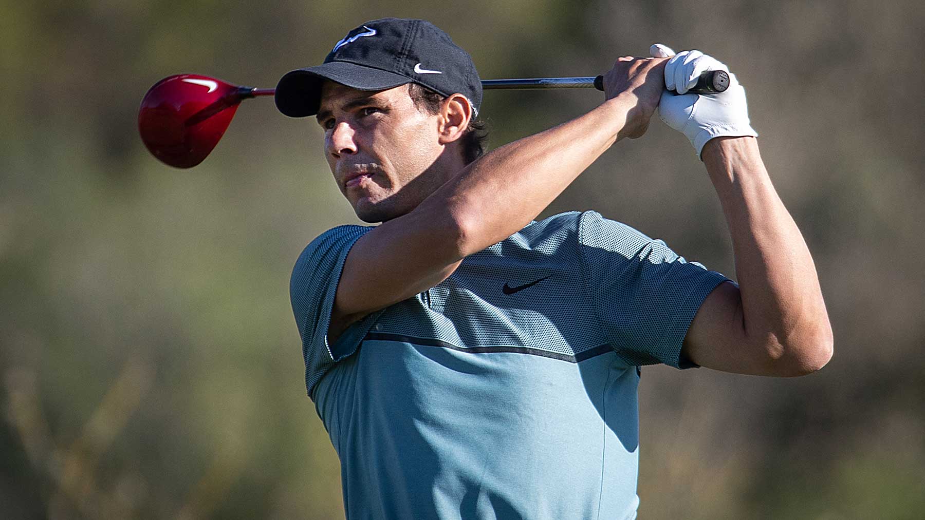 Rafa Nadal jugando al golf (AFP)