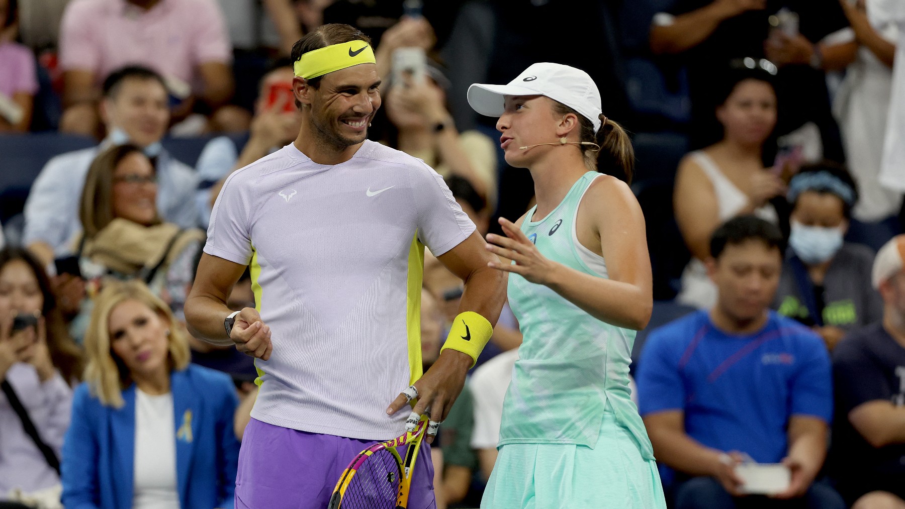 Rafa Nadal junto a Iga Swiatek. (AFP)