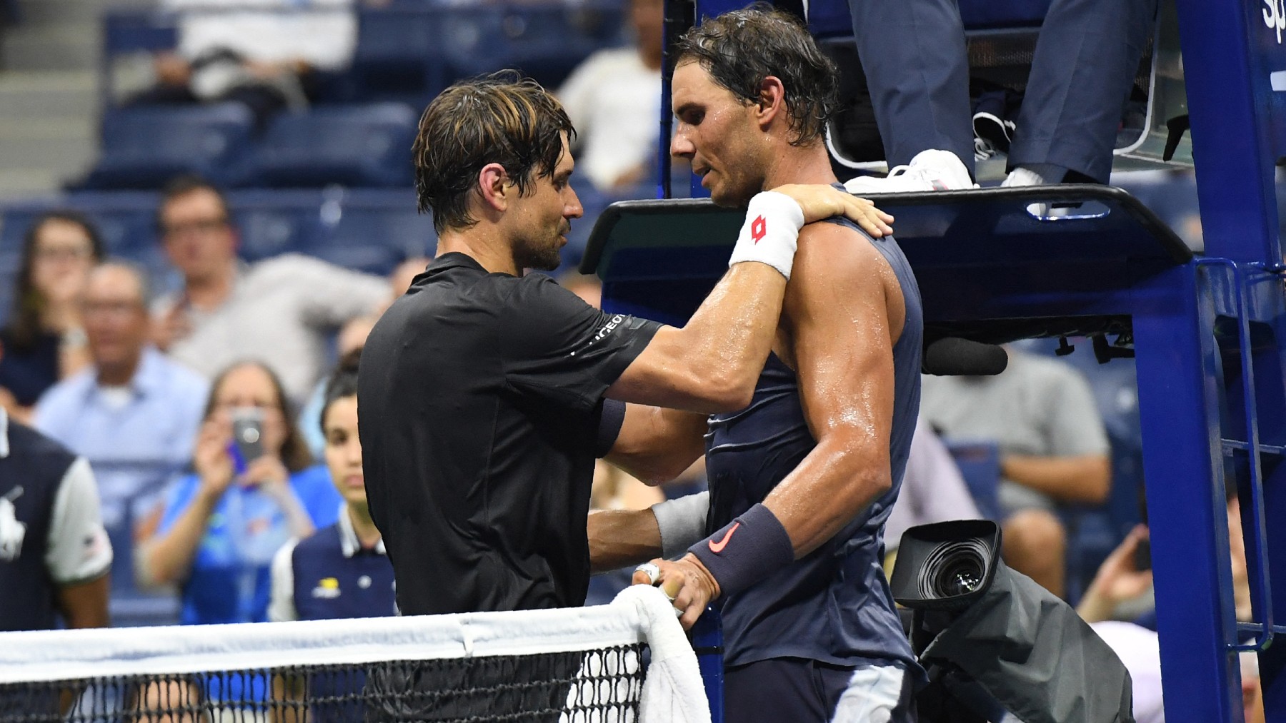 David Ferrer y Rafa Nadal, en uno de sus enfrentamientos. (AFP)