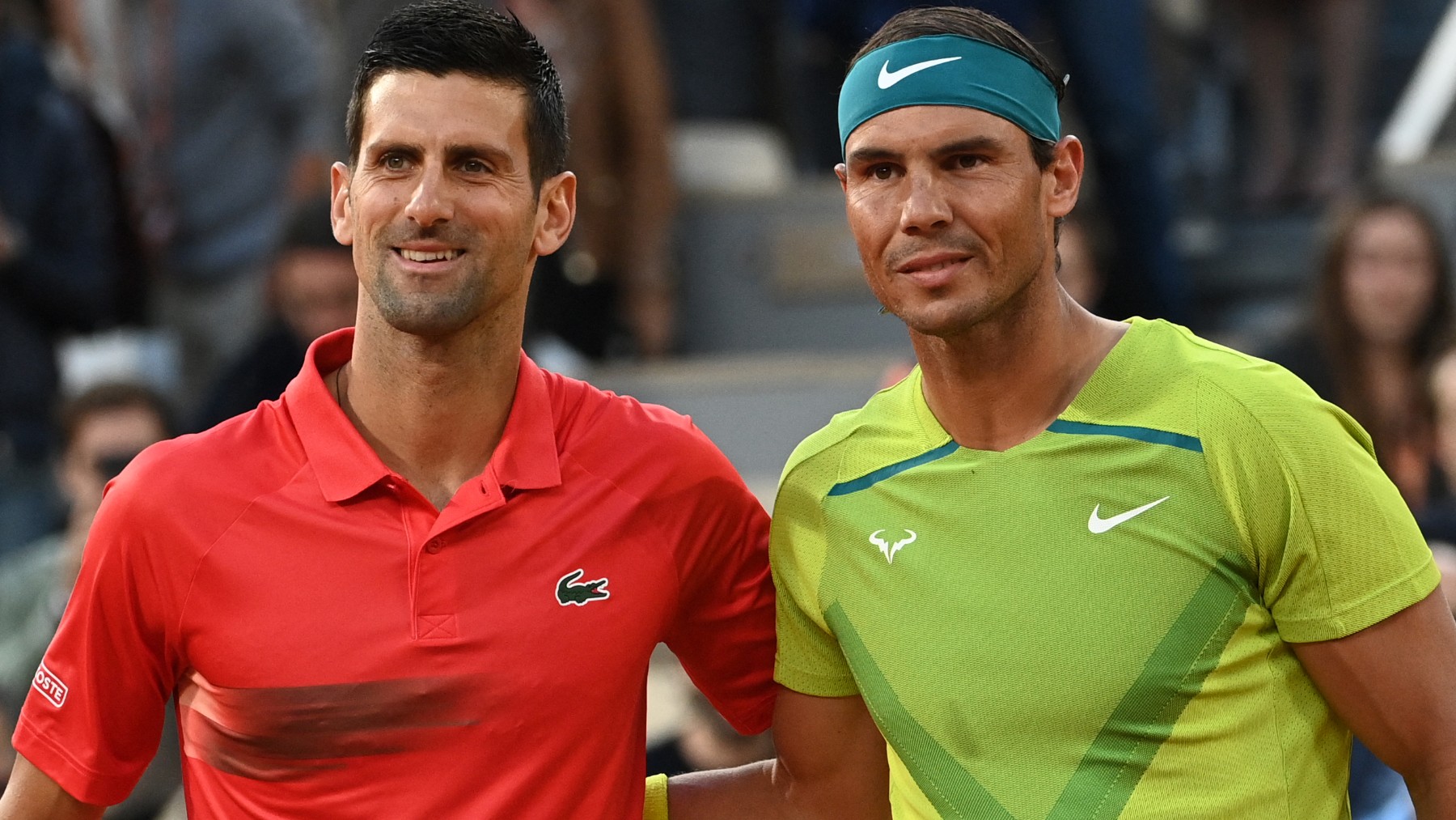 Djokovic y Nadal durante un partido en Roland Garros. (AFP)